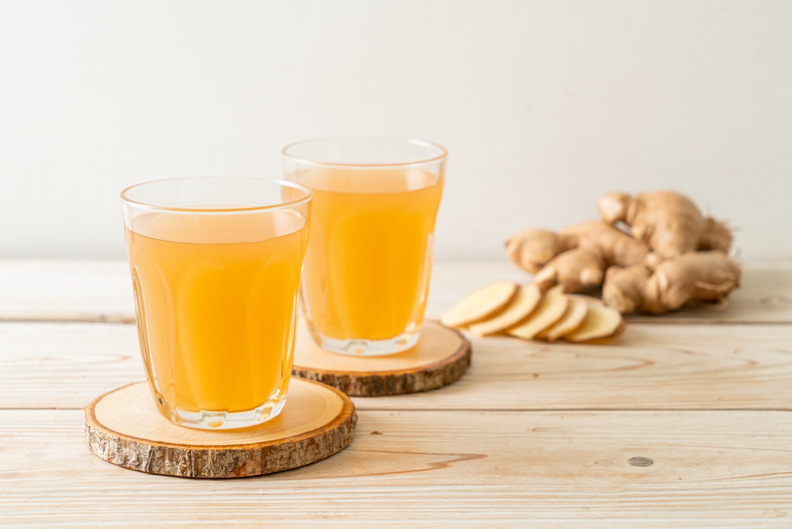 fresh and hot ginger juice glass with ginger roots – Healthy drink style Beverage, Juice, Glass